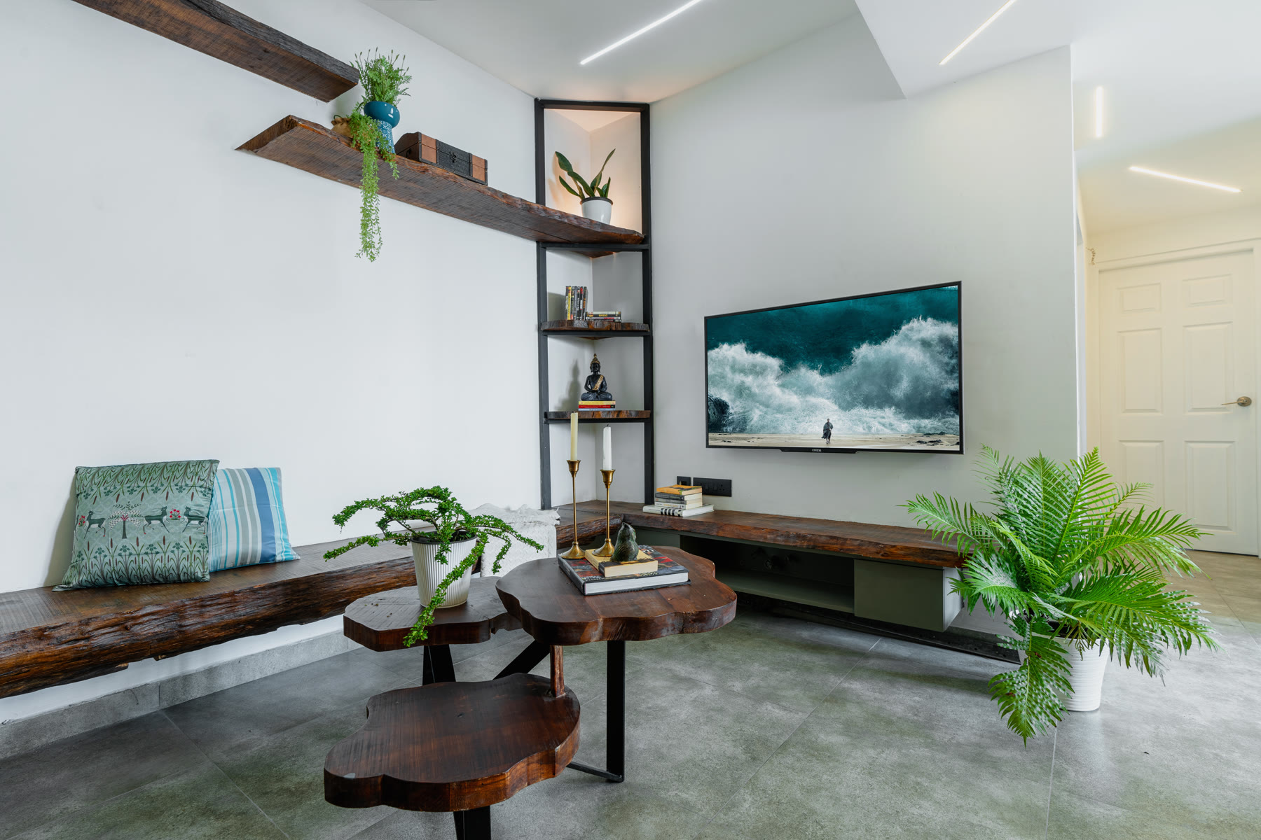 Ashcroft living room opening towards a planted terrace