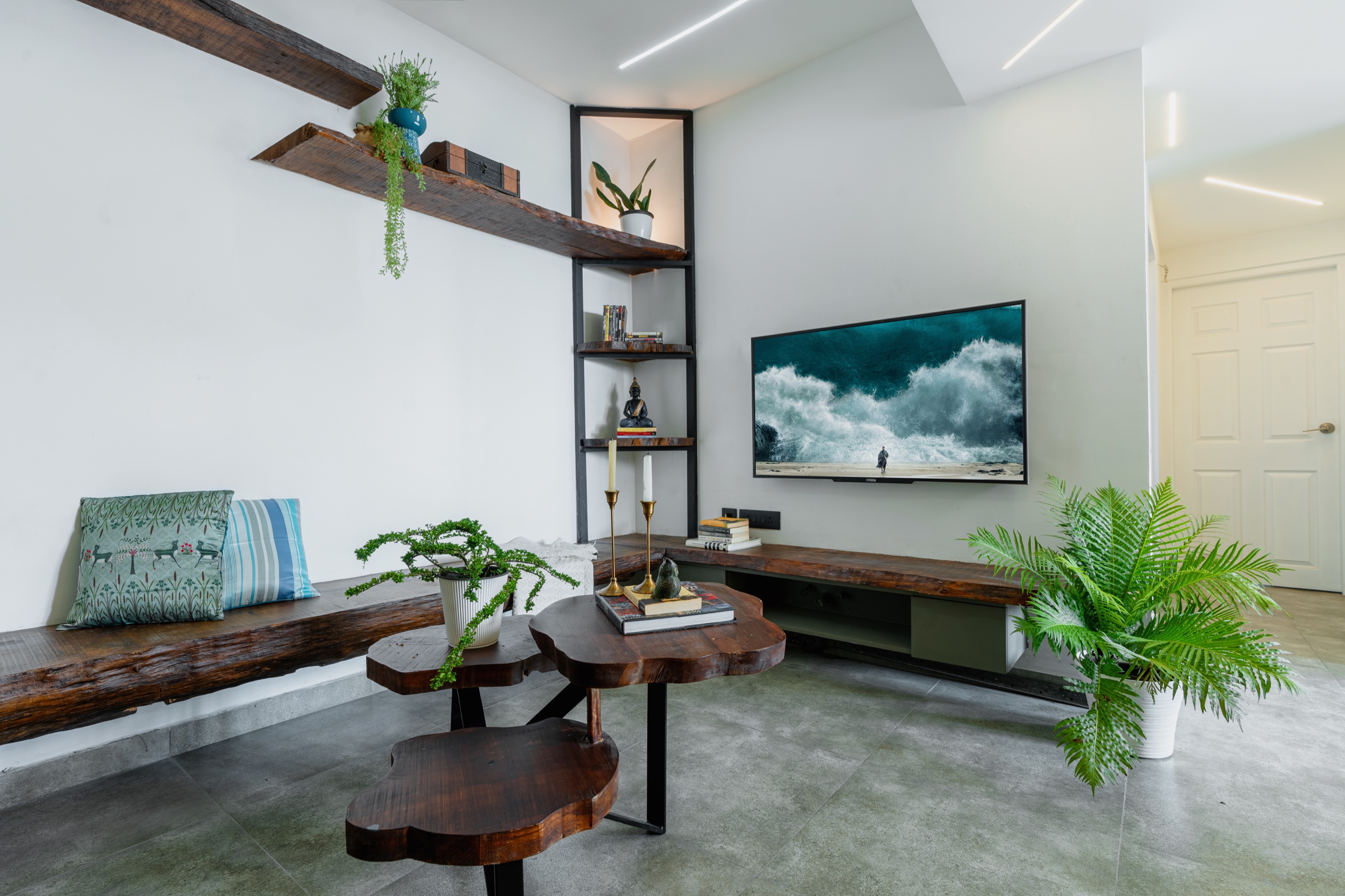 Ashcroft living room opening towards a planted terrace