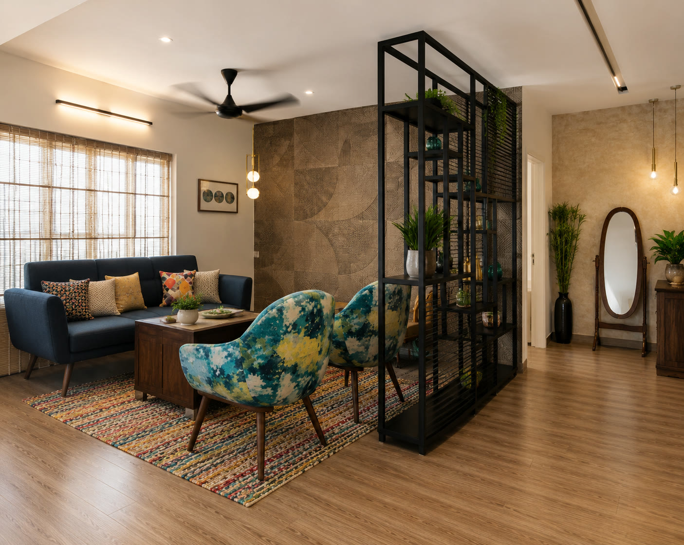 Grand Casa living room with blue seating and a sculptural metal screen