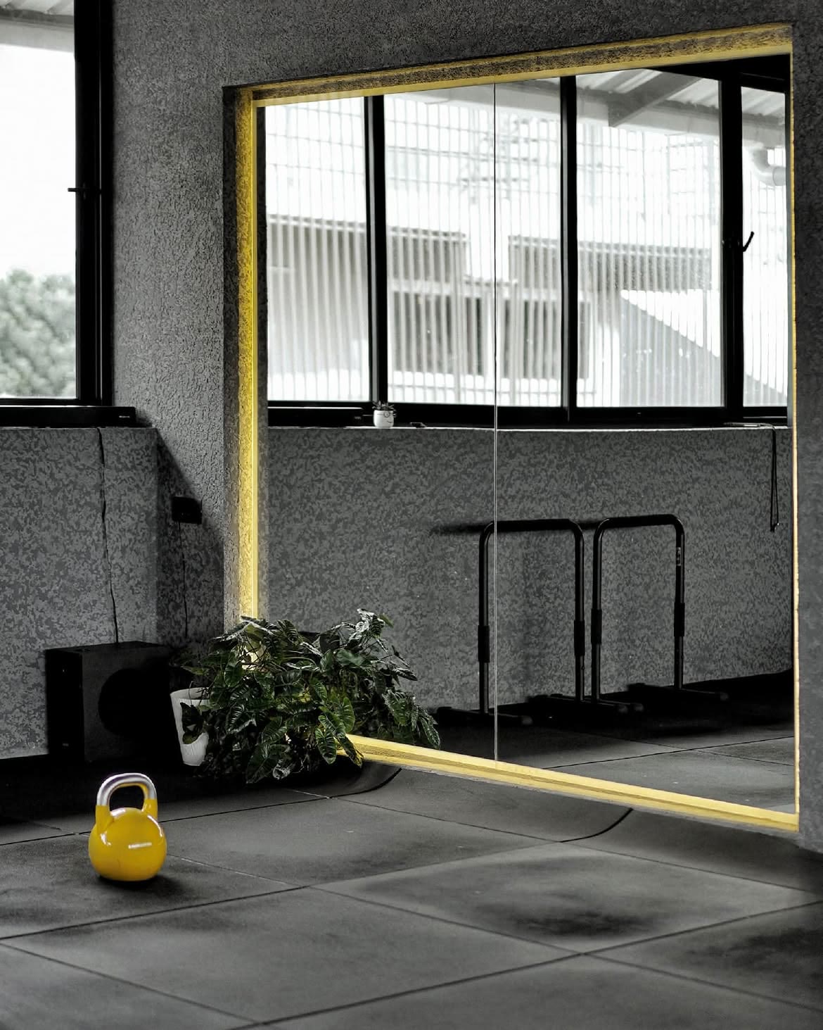 LIFT Studio training corner with black equipment and soft daylight