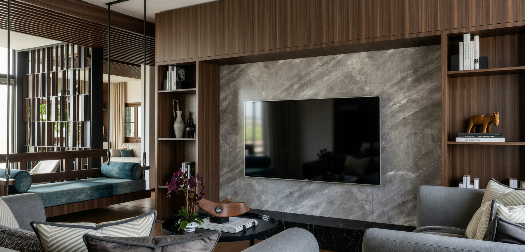 Wood Luxe living room wrapped in dark timber joinery